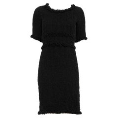 Chanel - Robe en tweed noir intemporelle avec breloque CC