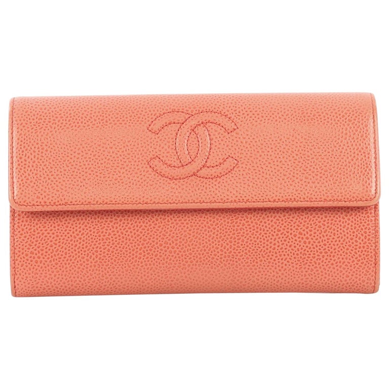 Chanel Zippy Embossed Leather Camellia Wallet CC-0407N-0114