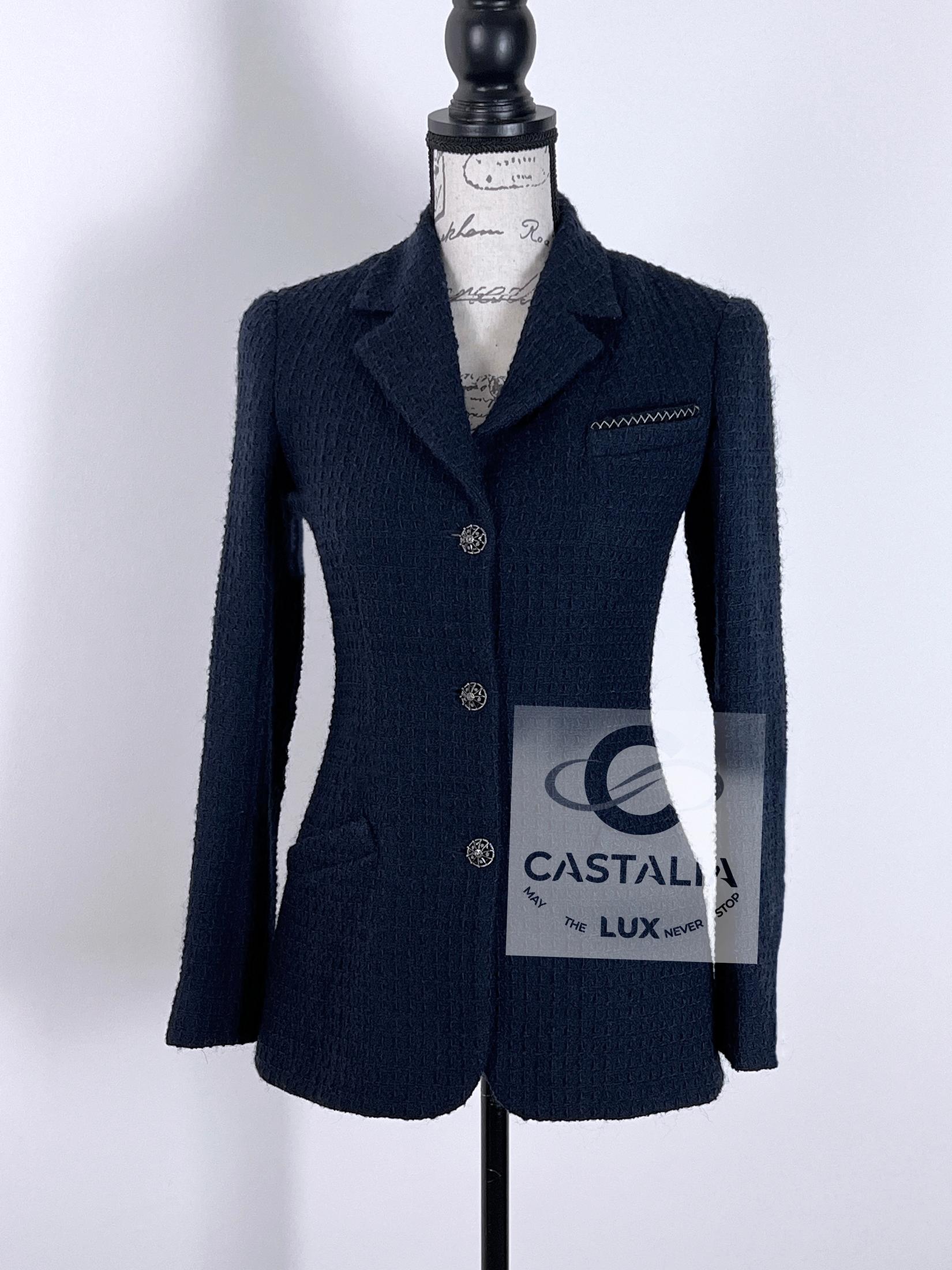 Timeless Chanel navy tweed jacket with jewel CC buttons ~ statement piece beyond time and trends!
Size mark 38 FR / Condition: never worn
- contrast collar with stitching, faux cuts at sleeves
- tonal silk lining with camellias, chain link at hem