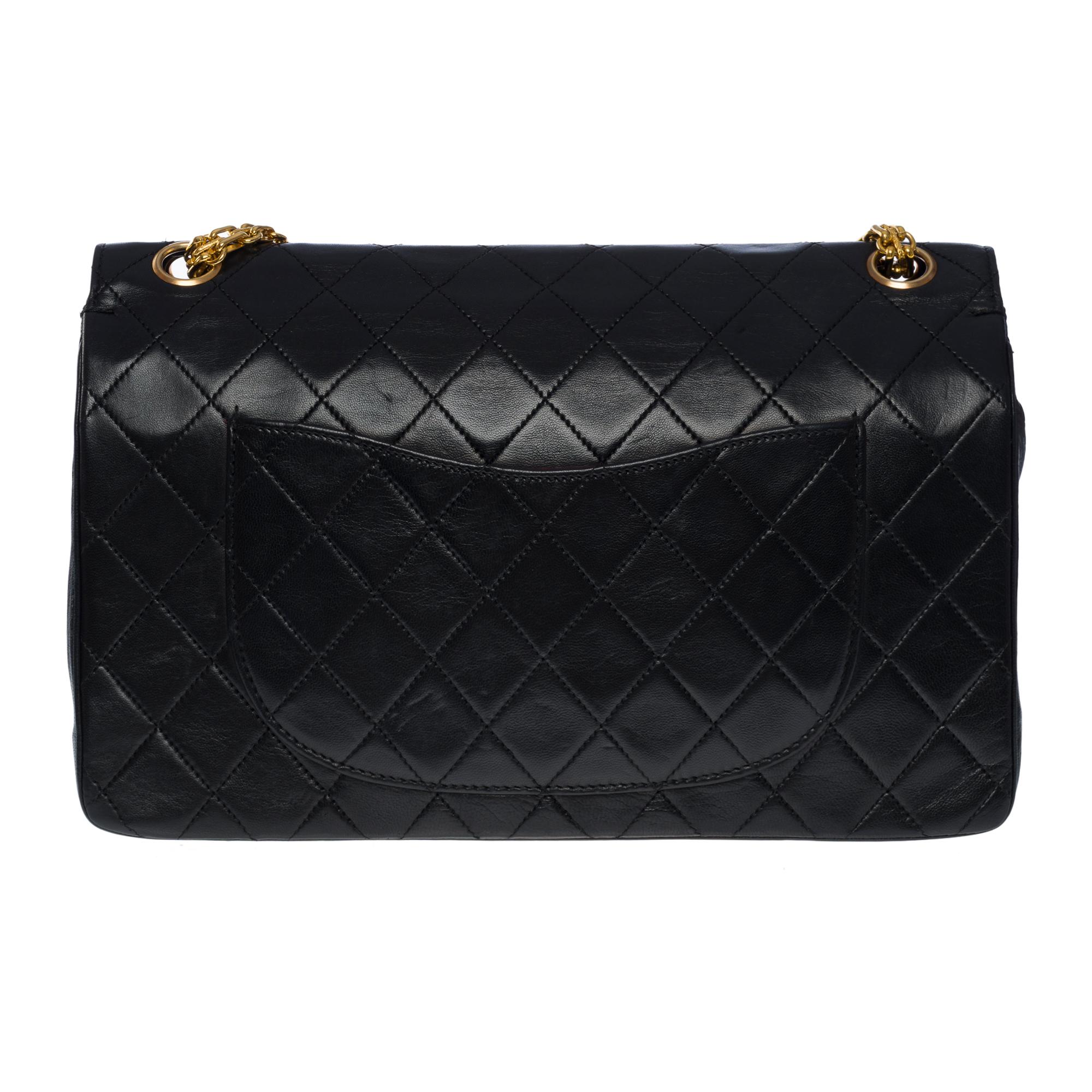 Chanel Timeless/Classic double flap shoulder bag in black quilted lambskin, GHW In Good Condition In Paris, IDF