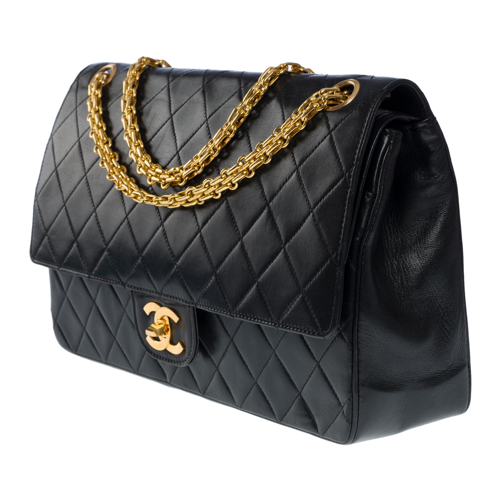 Women's Chanel Timeless/Classic double flap shoulder bag in black quilted lambskin, GHW