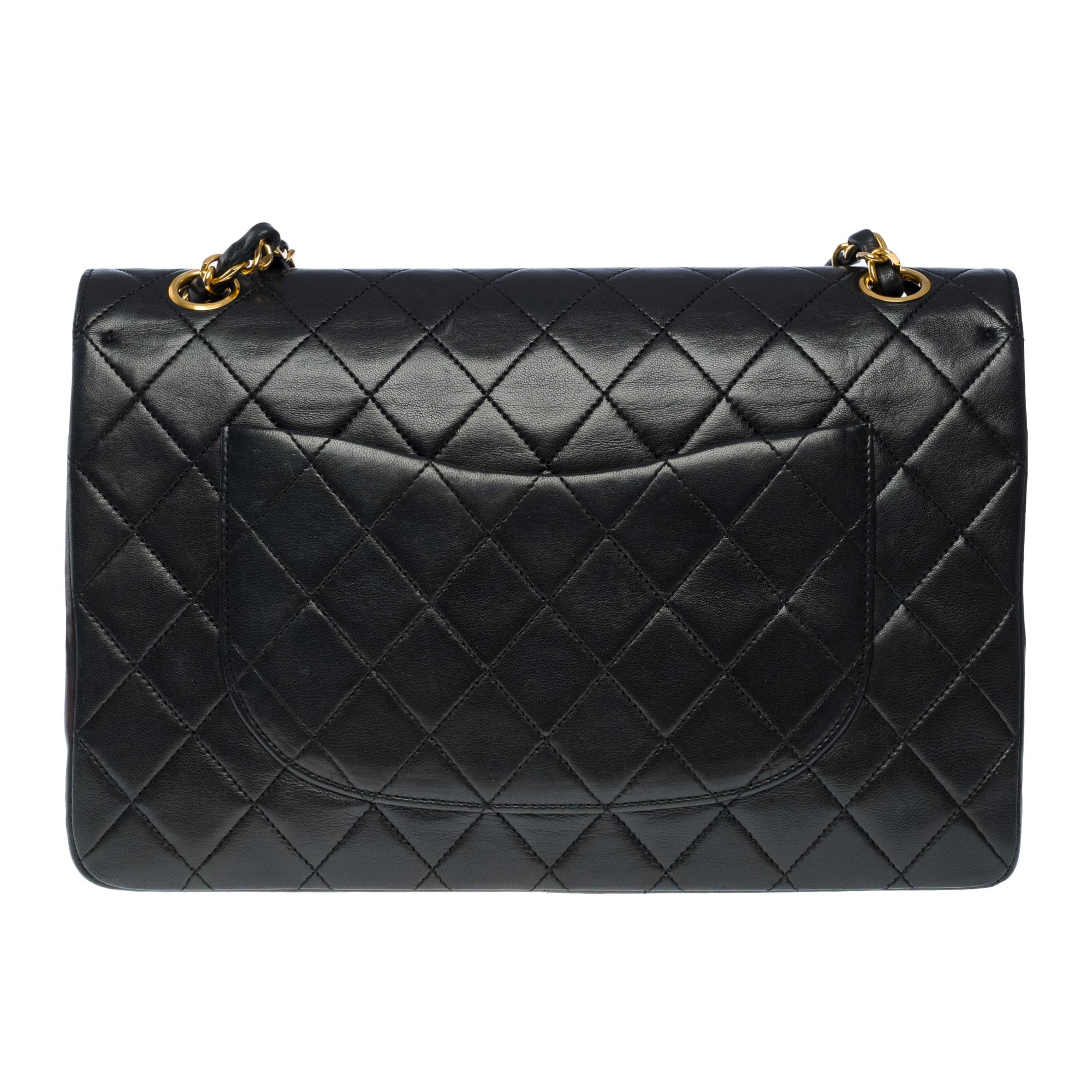 Women's Chanel Timeless/Classic double flap shoulder bag in black quilted lambskin , GHW