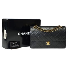 Chanel Timeless/Classic double flap shoulder bag in black quilted lambskin , GHW