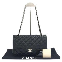Chanel Timeless Classic Flap Medium 2009 in pelle di agnello nera con finiture in argento