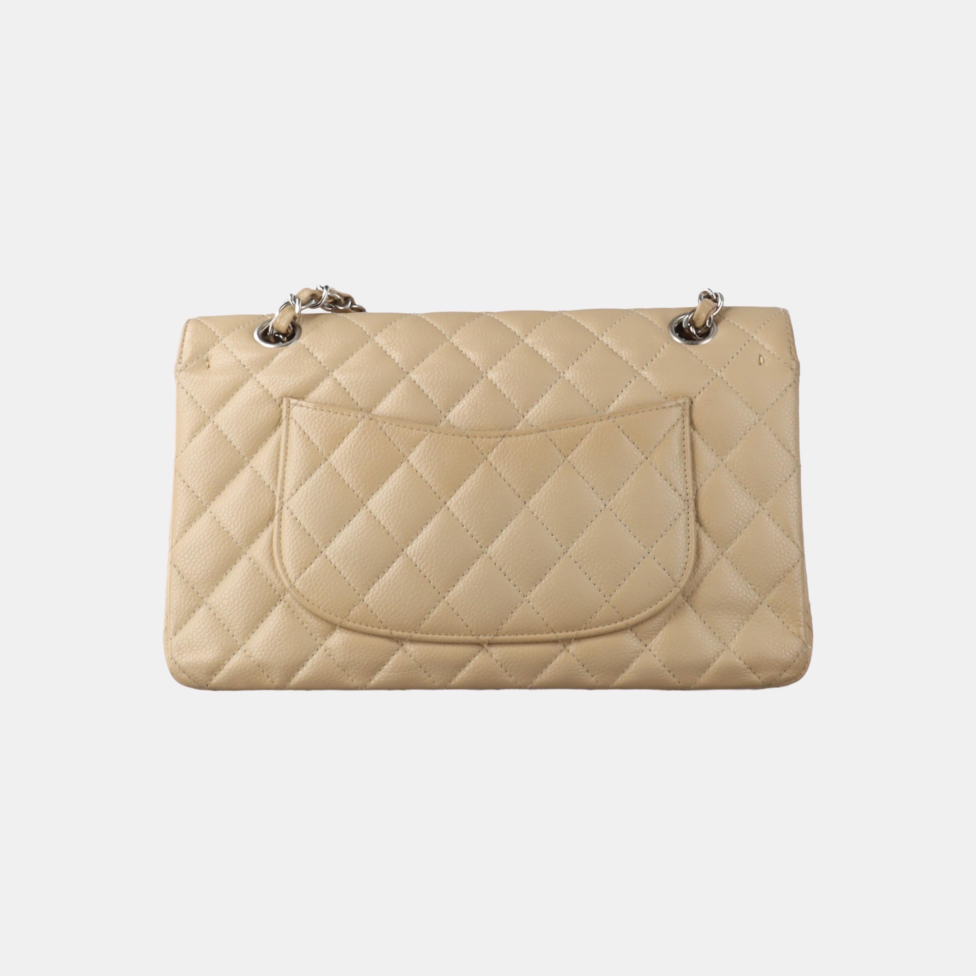 Chanel Timeless Classic Flap Medium Beige Caviar Leather Silver Hardware 2005 In Good Condition In AUBERVILLIERS, FR