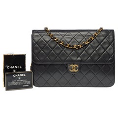 Chanel Timeless/Classic Push Lock, borsa a tracolla in agnello trapuntato nero, GHW