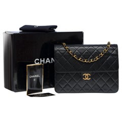 Chanel Timeless/Classic Push Lock shoulder flap bag in black quilted lamb , GHW