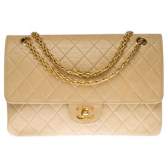 Used Chanel Timeless/Classique handbag with double flap in beige lambskin, GHW