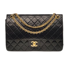 Chanel Timeless/Classique shoulder bag 27 cm in black quilted leather, GHW