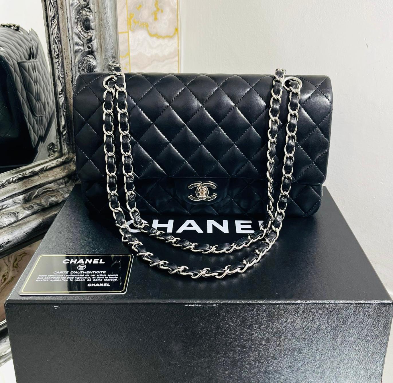 Chanel Timeless Double Flap Leather Bag

Soft body, black bag designed with iconic diamond quilting and double flap with zipped pocket.

Detailed with Chanel’s signature interlocking ‘CC’ turn-lock fastening with leather and chain link shoulder