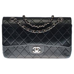Chanel Timeless double flap Medium Shoulder bag in black quilted leather, SHW