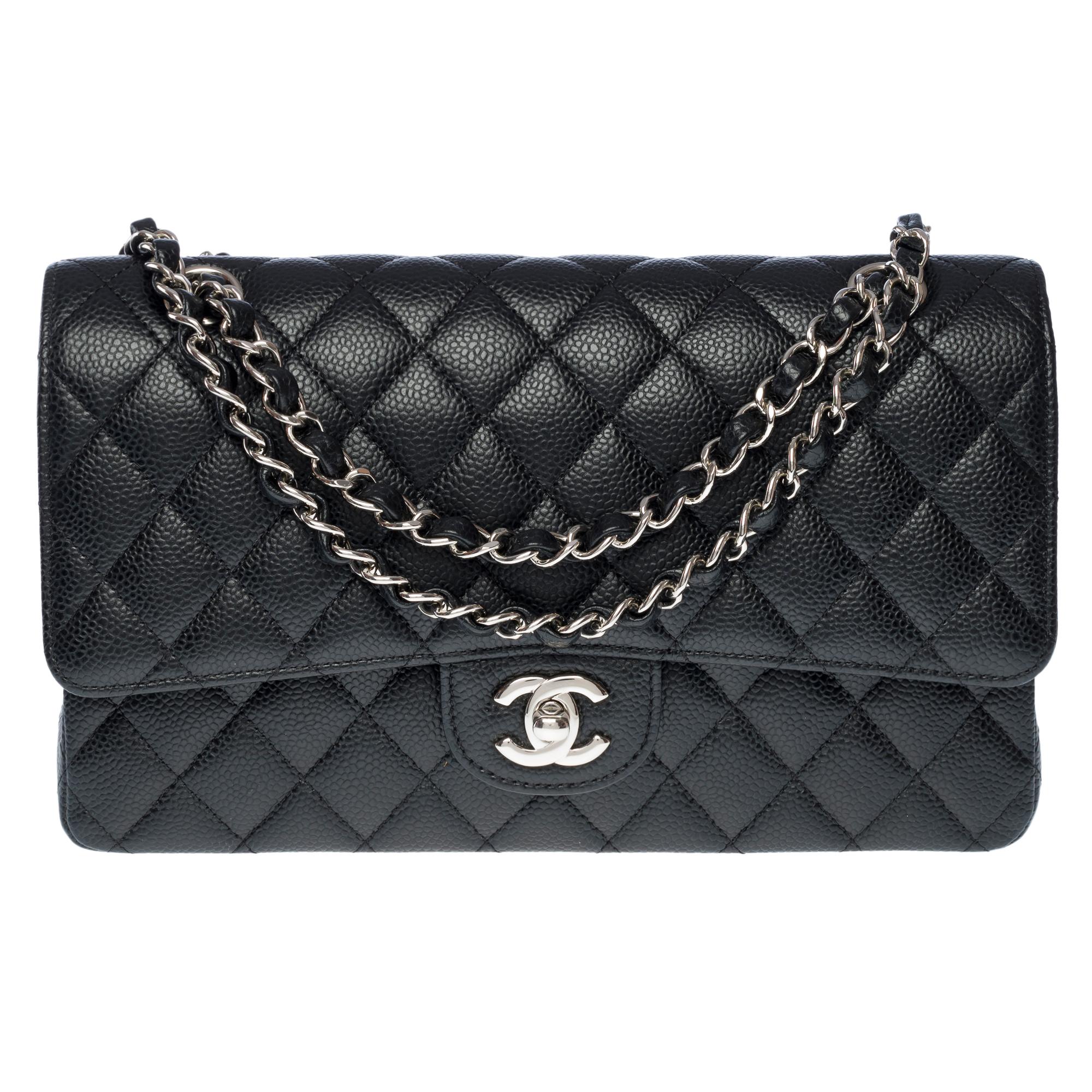 Black Chanel Timeless double flap shoulder bag in black Caviar quilted leather, PHW