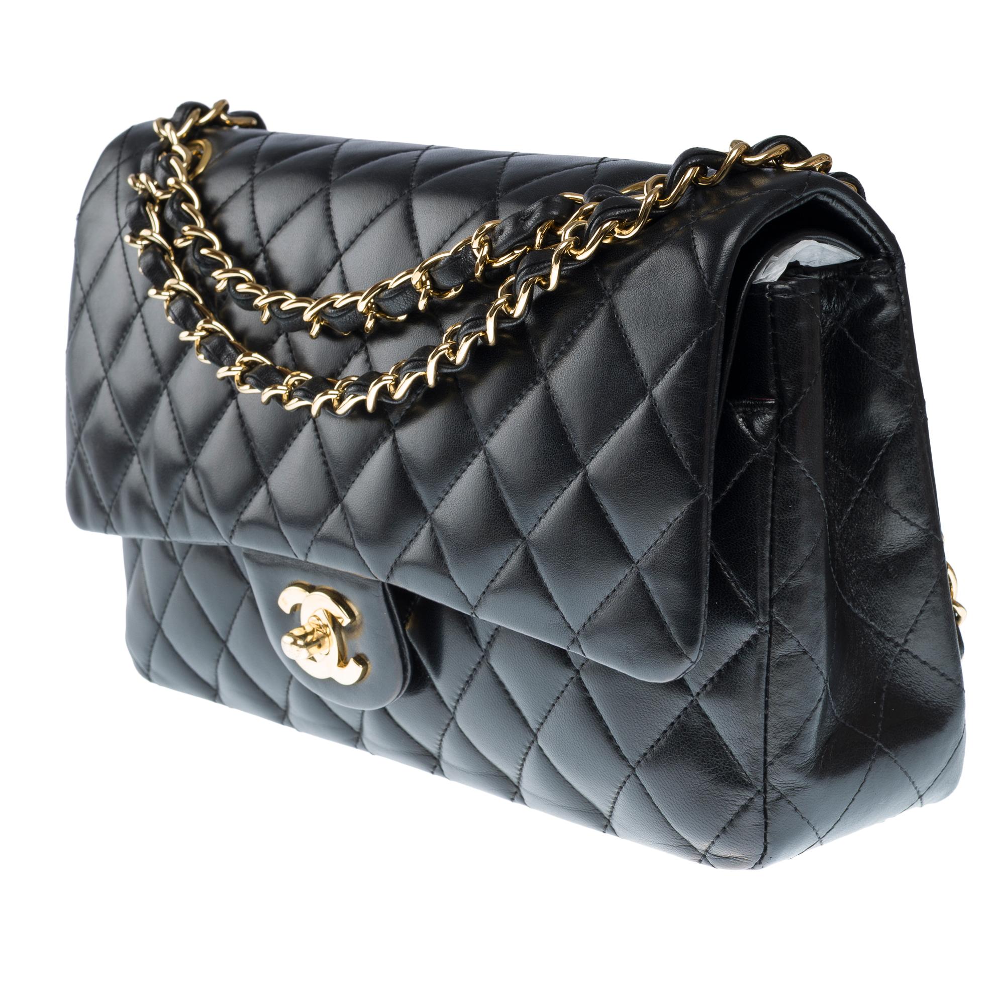 Chanel Timeless double flap shoulder bag in Black lambskin Quilted leather, GHW 1