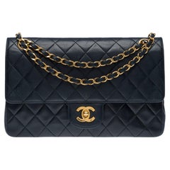 Chanel Timeless, borsa a tracolla con doppia patta in pelle d'agnello nera trapuntata, GHW