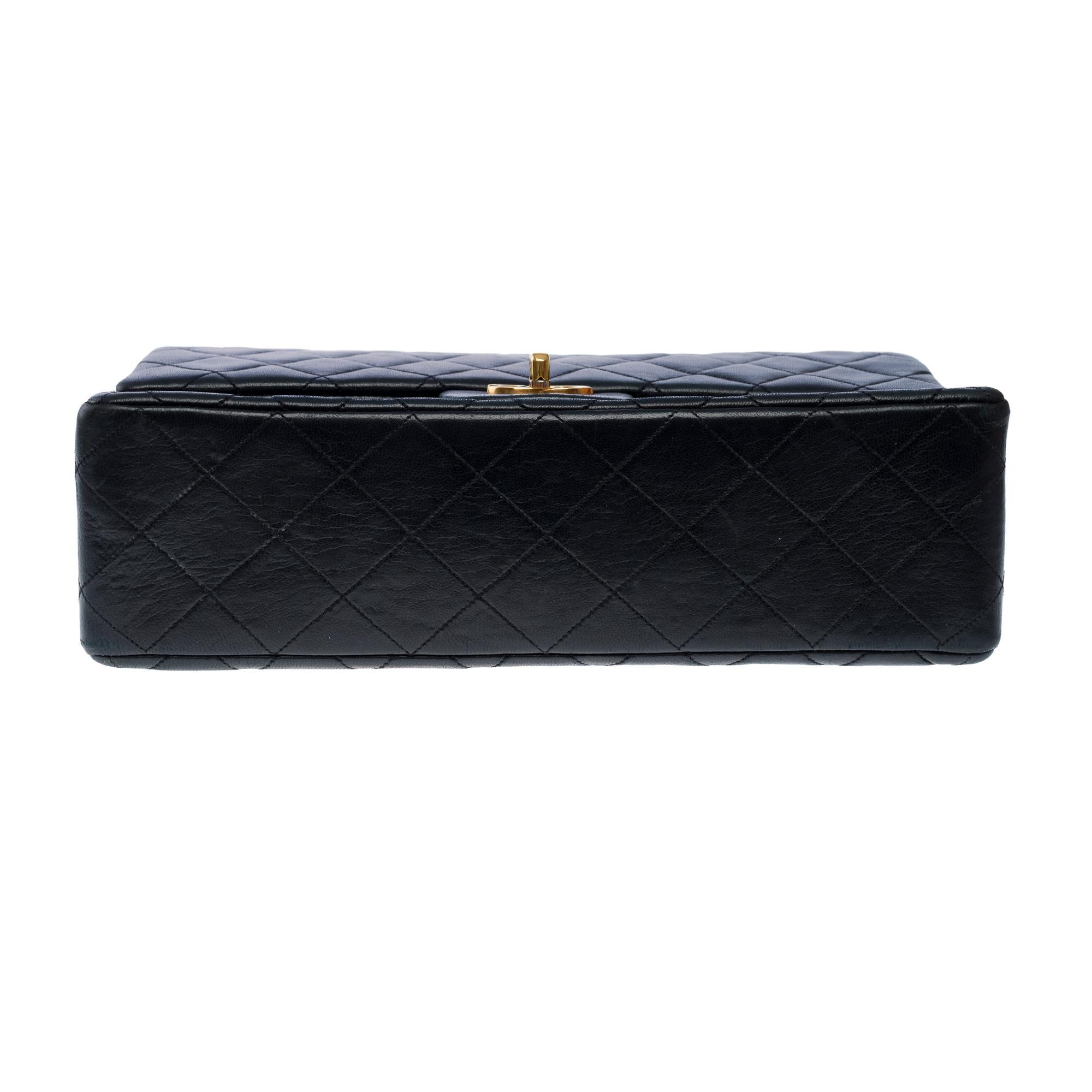 Chanel Timeless double flap shoulder bag in Black Quilted Lambskin leather, GHW For Sale 7