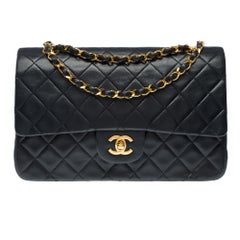 Chanel Timeless double flap shoulder bag in Black quilted lambskin leather, GHW