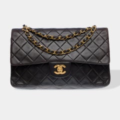 Chanel Timeless Double flap shoulder bag in Black Quilted Lambskin leather, GHW