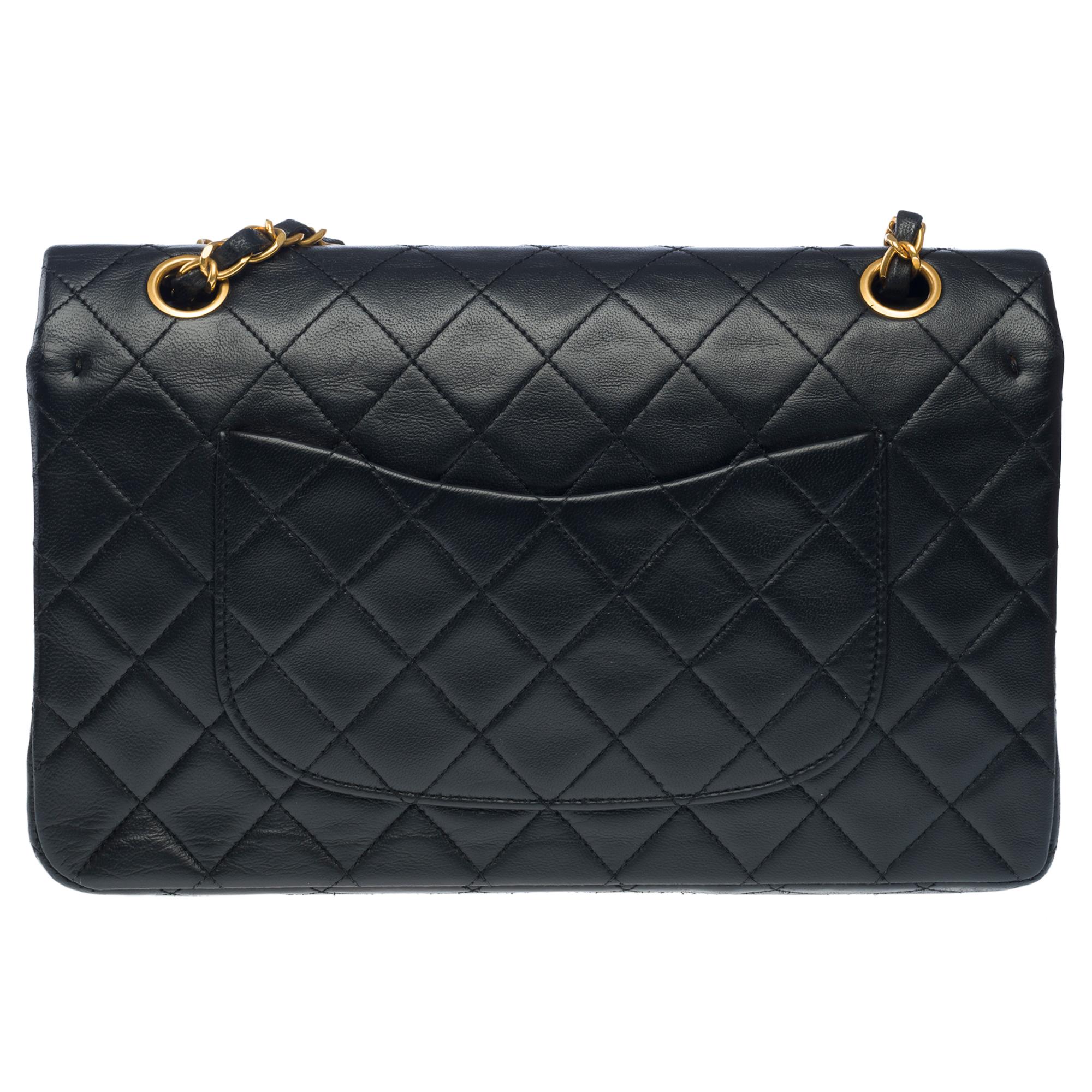 Chanel Timeless double flap shoulder bag in black quilted lambskin leather, GHW In Good Condition For Sale In Paris, IDF