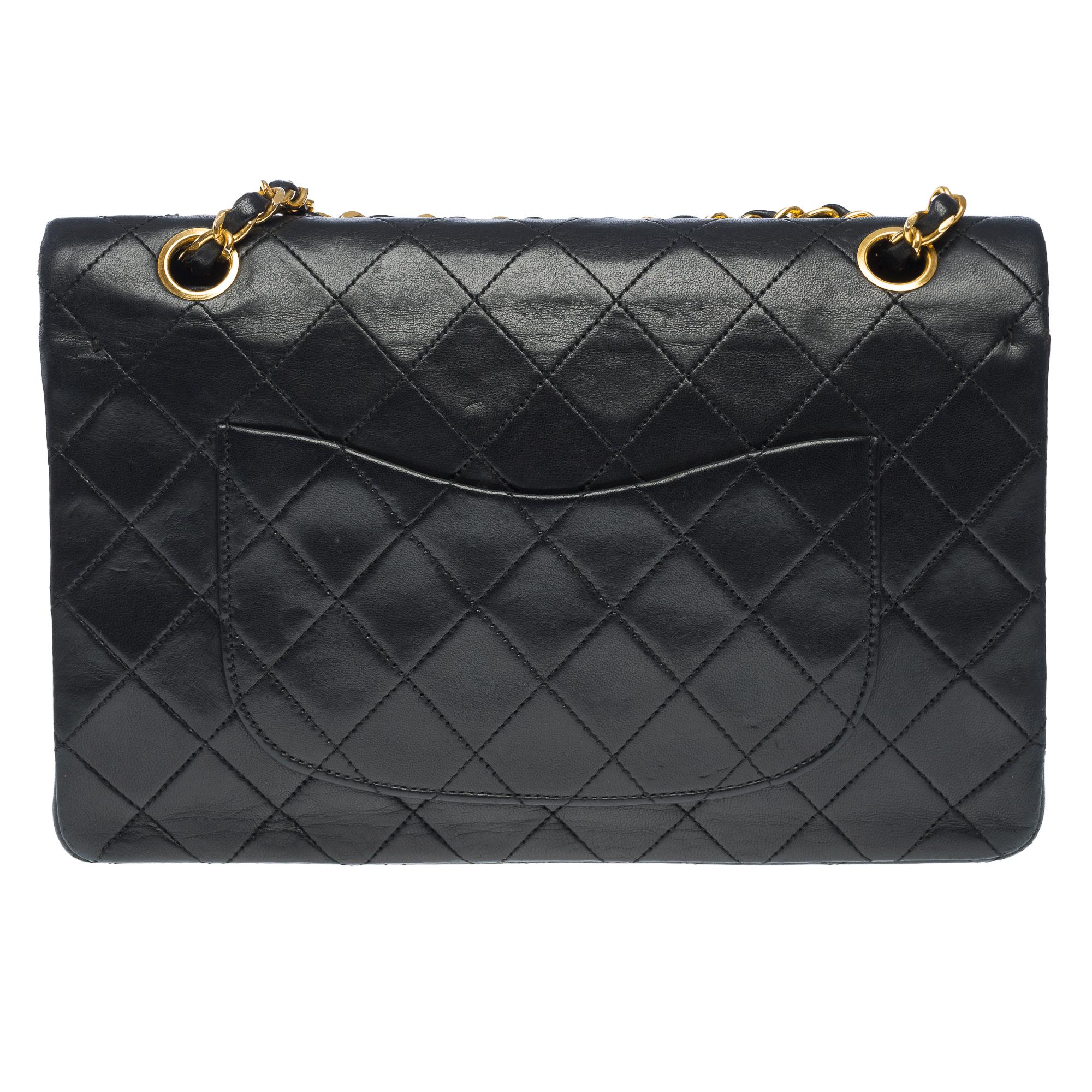 Chanel Timeless double flap shoulder bag in Black quilted lambskin leather, GHW In Good Condition In Paris, IDF