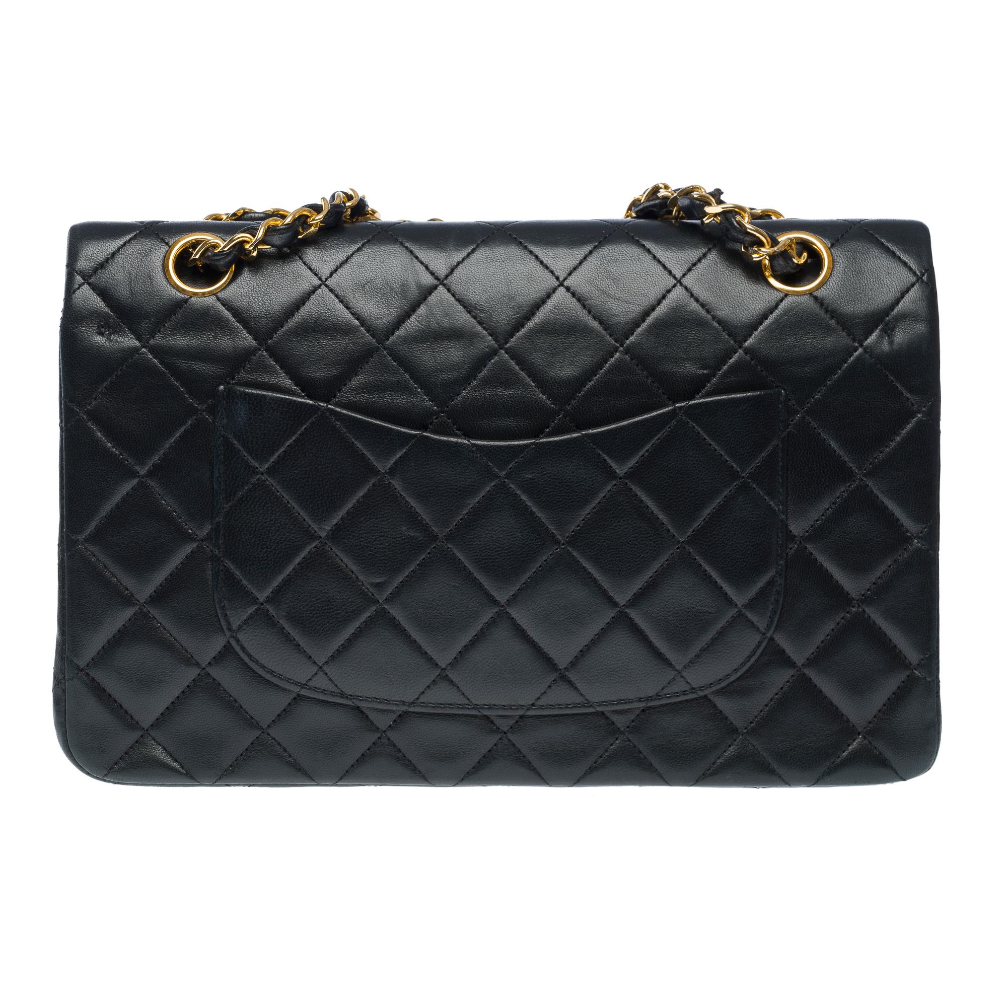 Chanel Timeless double flap shoulder bag in Black quilted lambskin leather, GHW In Good Condition For Sale In Paris, IDF