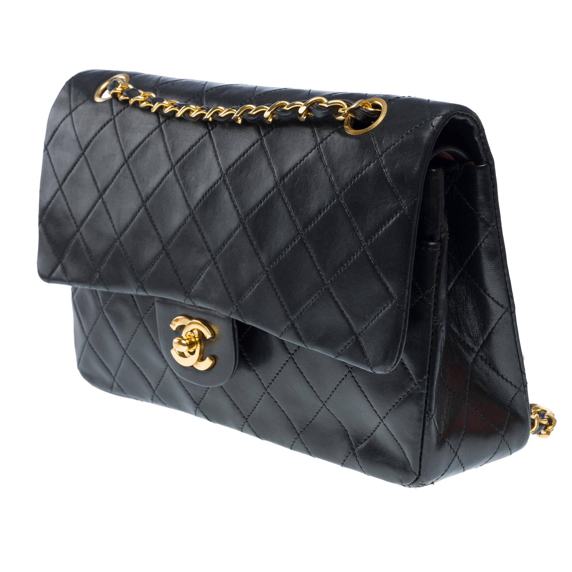 Women's Chanel Timeless double flap shoulder bag in Black quilted lambskin leather, GHW