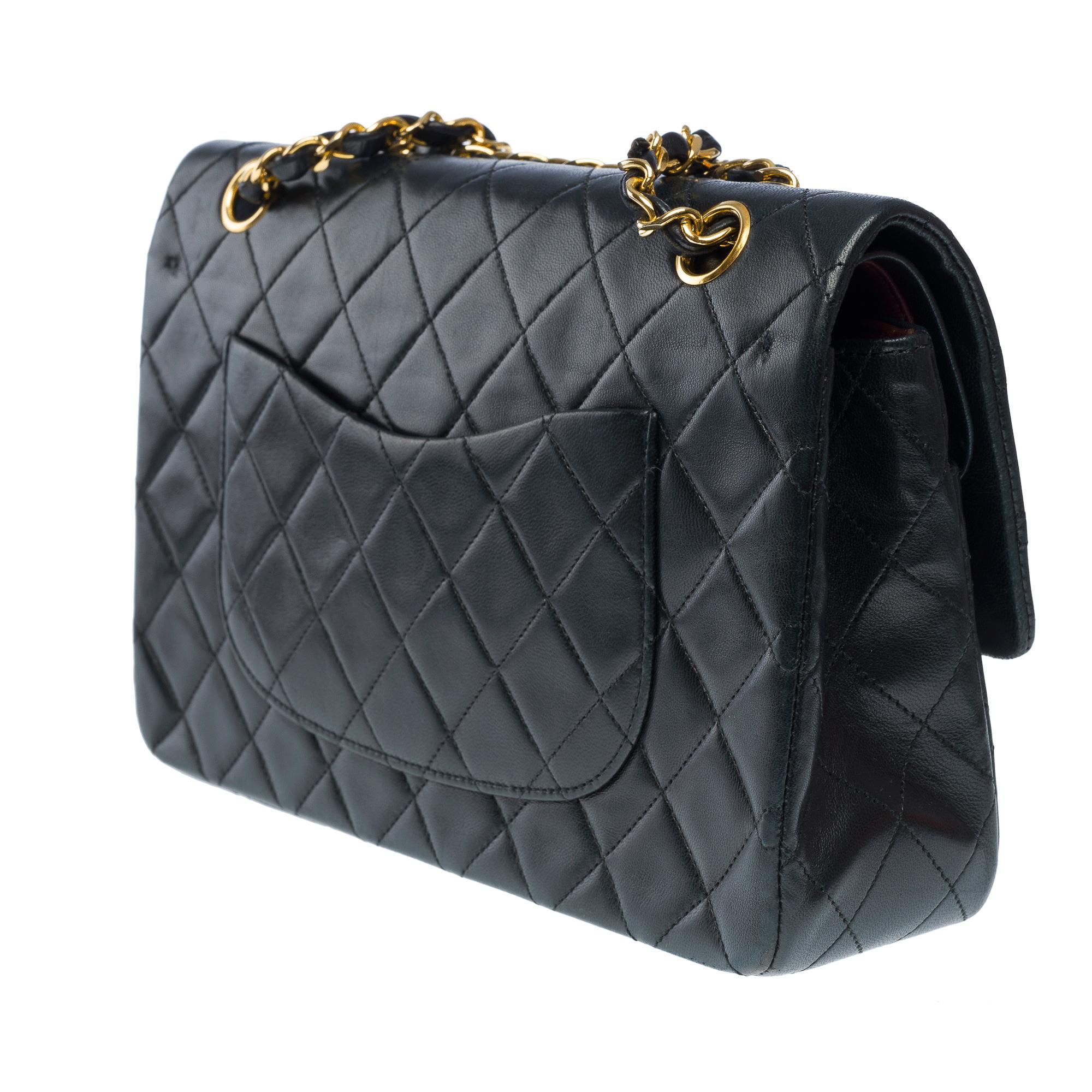 Chanel Timeless double flap shoulder bag in Black quilted lambskin leather, GHW For Sale 1