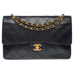 Chanel Timeless double flap shoulder bag in Black quilted lambskin leather, GHW