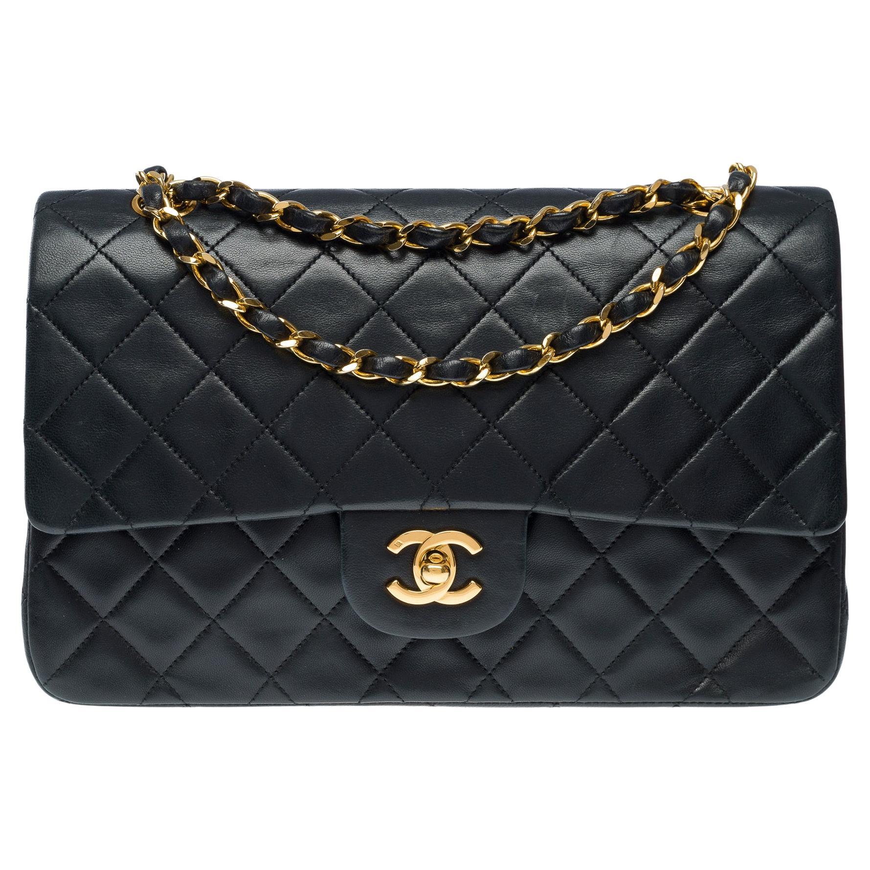 Chanel Timeless double flap shoulder bag in Black quilted lambskin leather, GHW For Sale