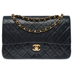Chanel Timeless double flap shoulder bag in Black quilted lambskin leather, GHW