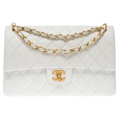 Chanel Timeless Sac à double rabat en cuir d'agneau blanc matelassé