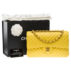 Chanel Timeless, borsa a tracolla con doppia patta in agnello trapuntato a spina di pesce giallo, GHW
