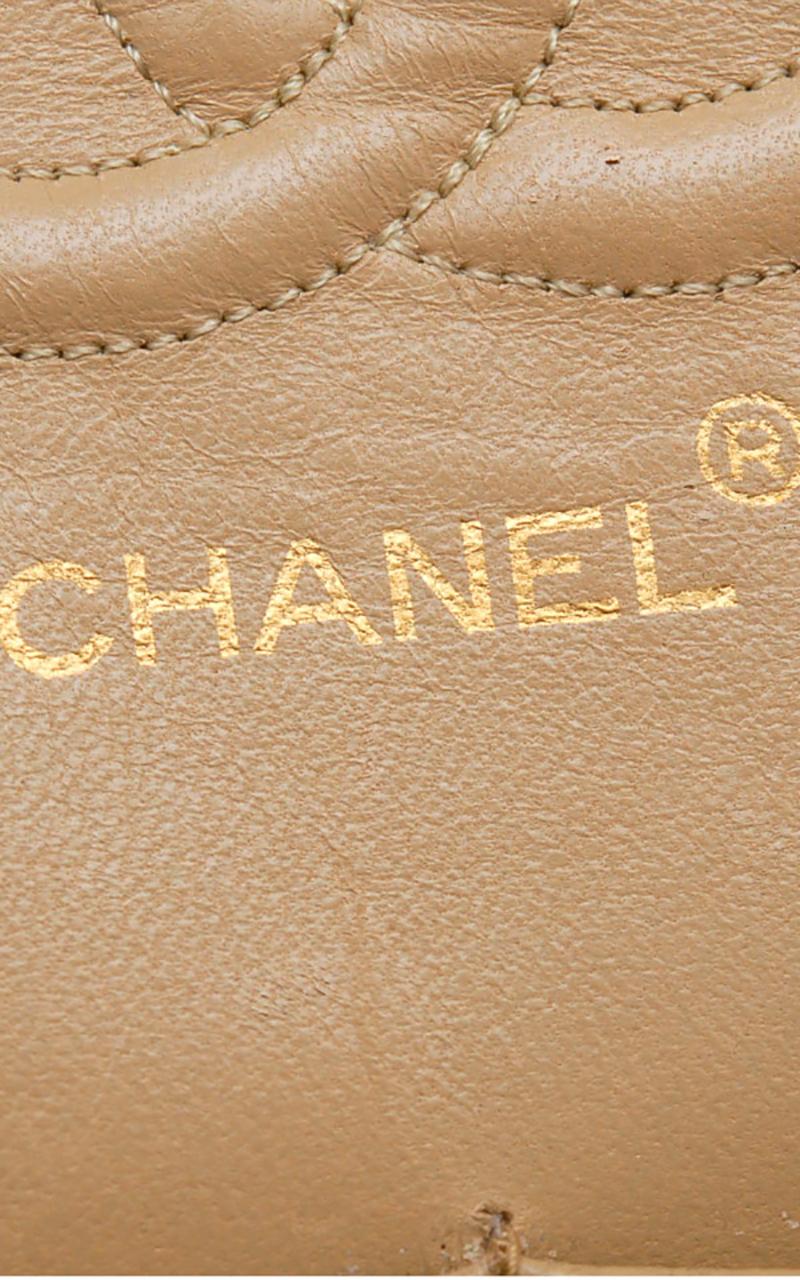 Chanel Timeless handbag in beige quilted leather 6