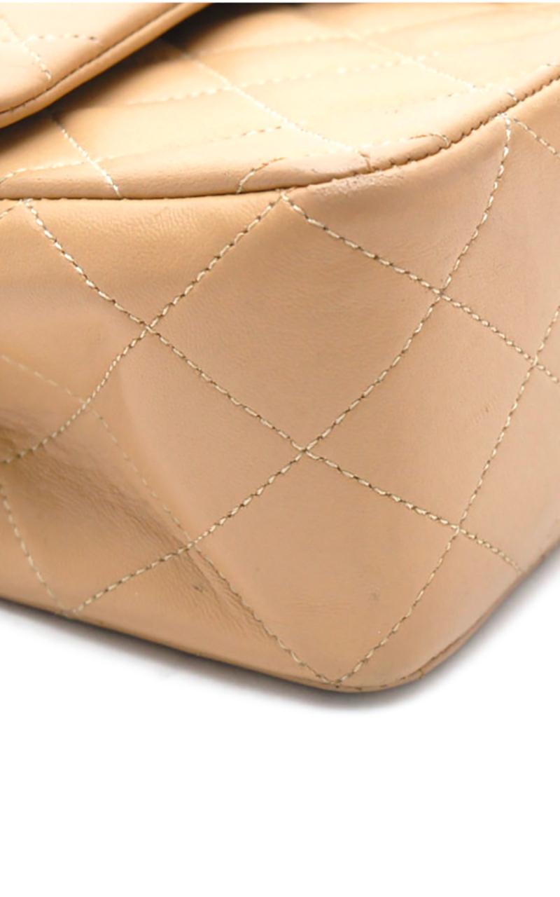 Chanel Timeless handbag in beige quilted leather 1