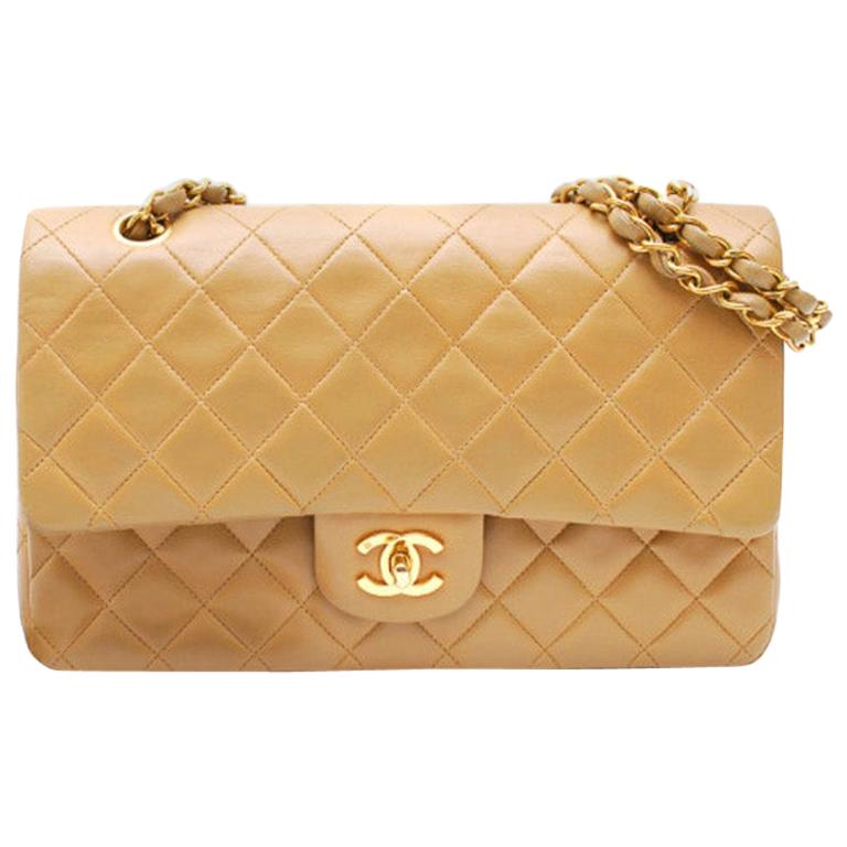 Chanel Timeless handbag in dark beige quilted leather Gold Chain 