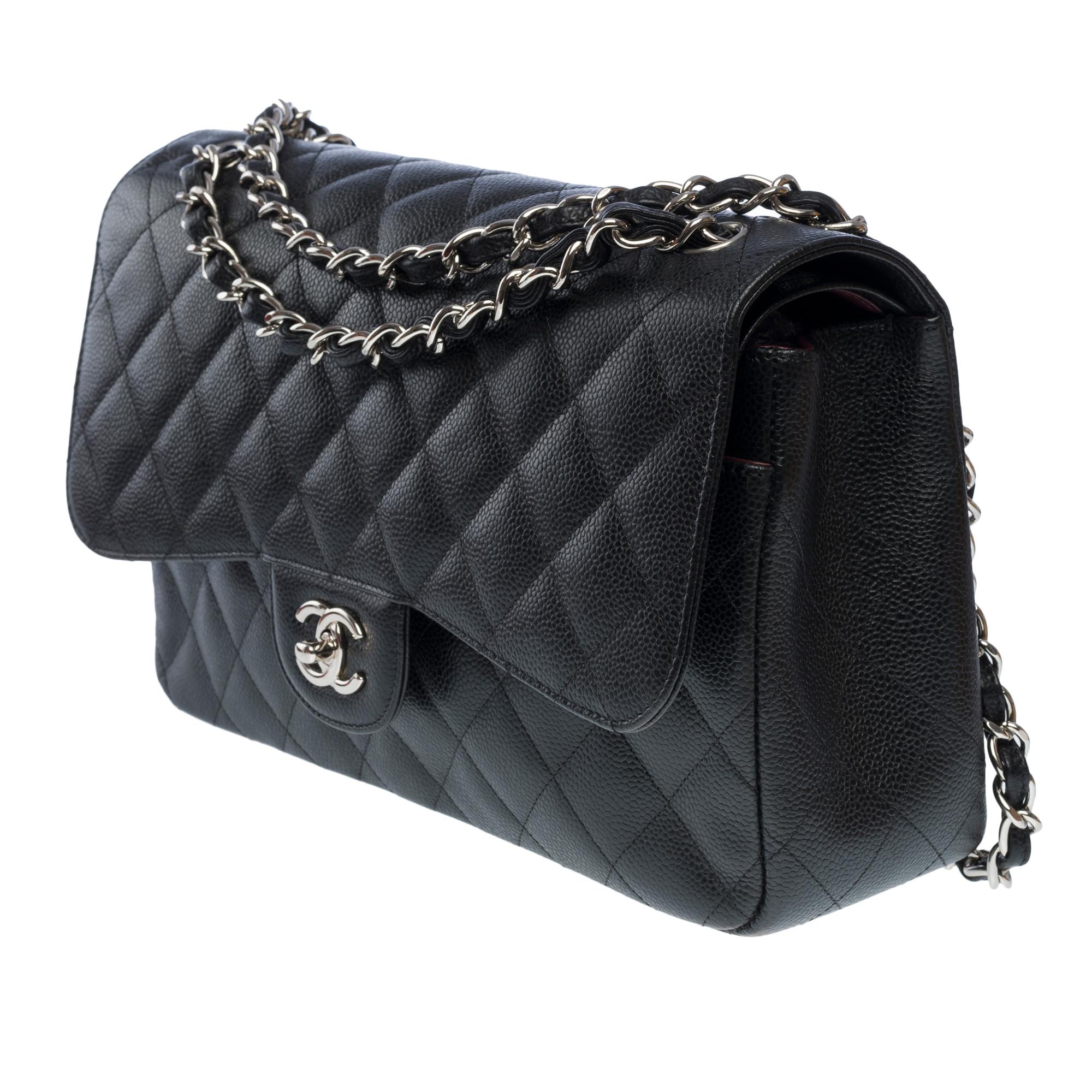 Women's Chanel Timeless Jumbo double flap bag in black quilted caviar leather, SHW