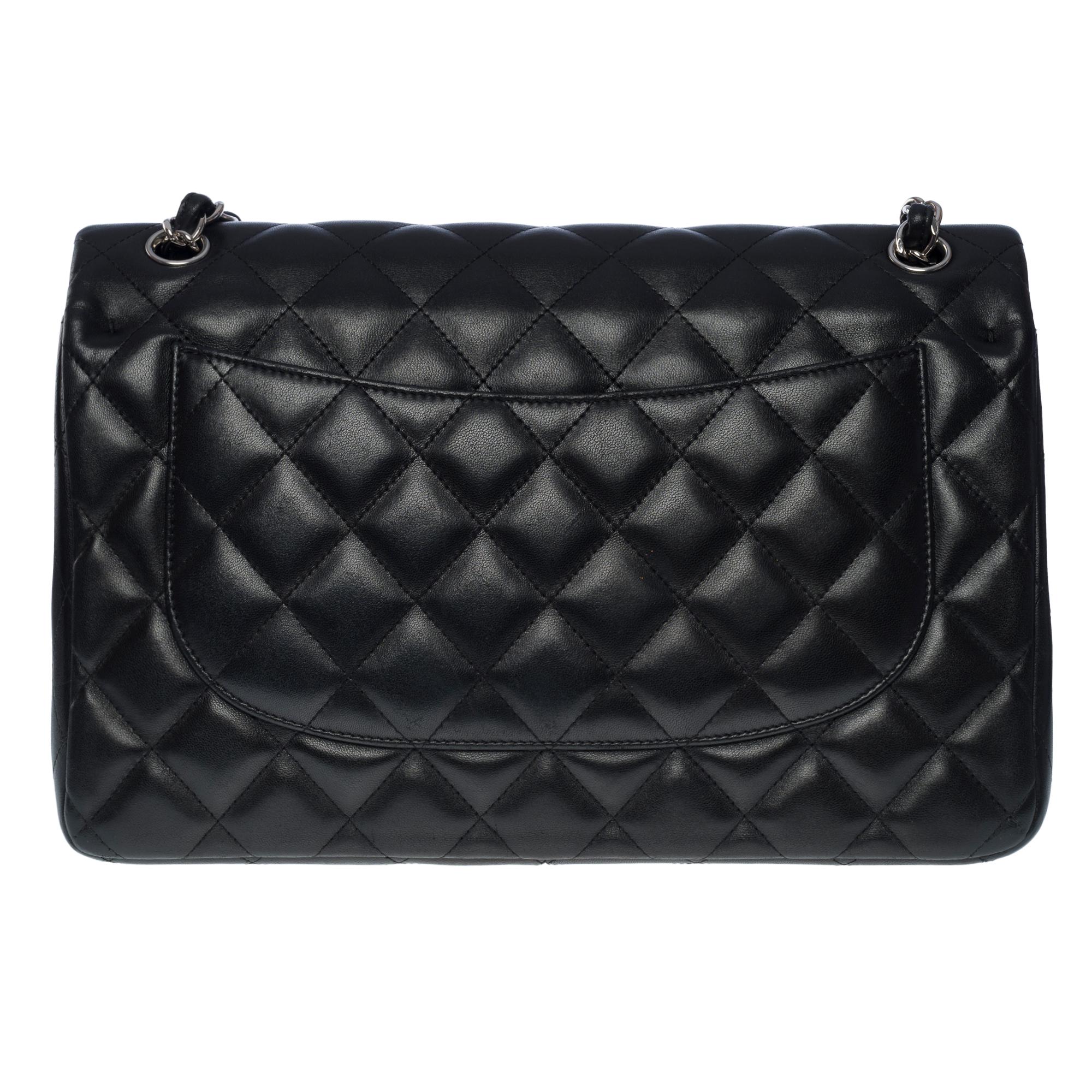 Chanel Timeless Jumbo double flap shoulder bag in black quilted lamb leather, SHW In Good Condition In Paris, IDF