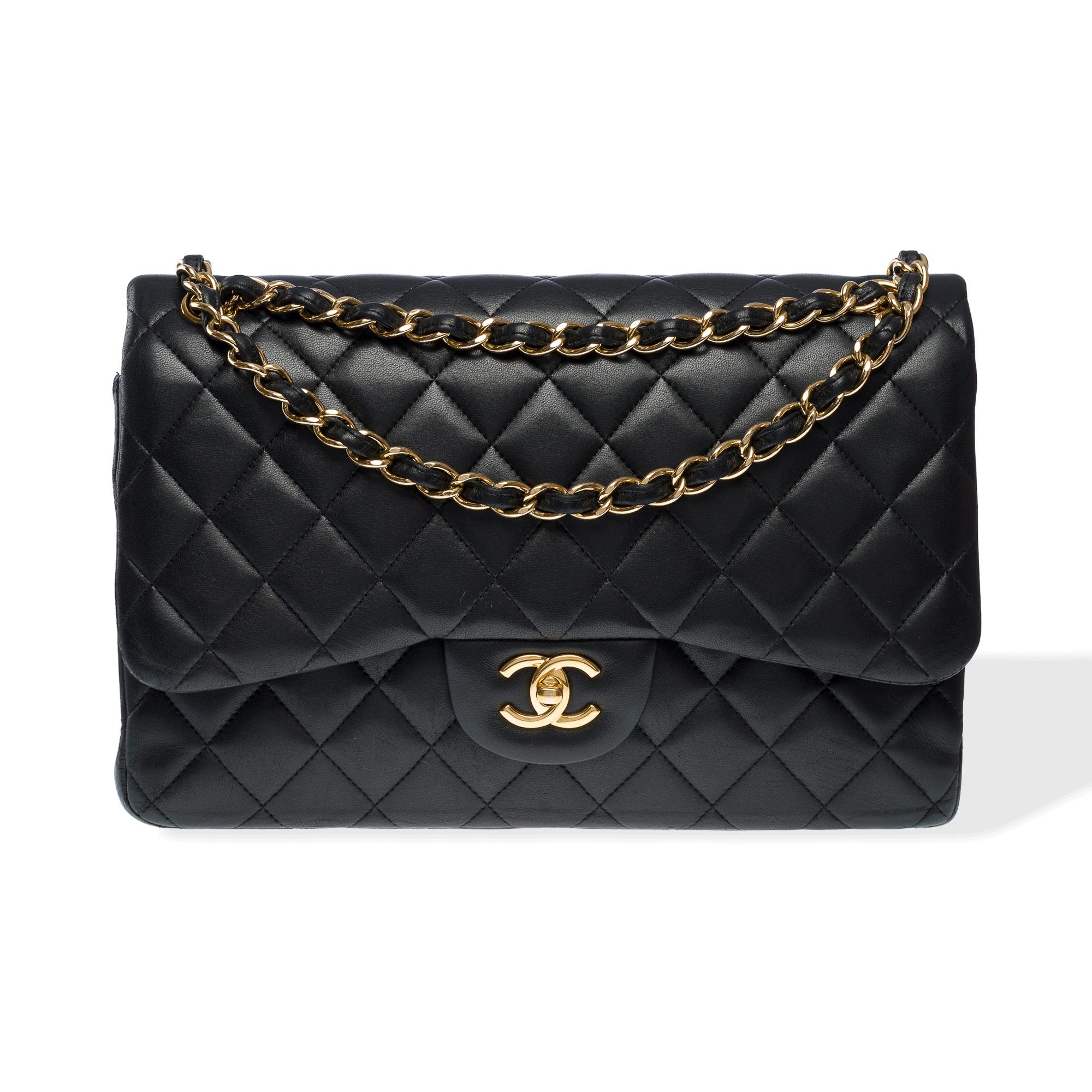 Majestic​​ ​​Chanel​​ ​​Timeless​​ ​​Jumbo​​ ​​double​​ ​​flap​​ ​​shoulder​​ ​​bag​​ ​​​​ ​​in​​ ​​black​​ ​​quilted​​ ​​lambskin​​ ​​leather,​​ ​​gold​ ​​metal​​ ​​hardware,​​ ​​gold​​ ​​metal​​ ​​chain​​ ​​handle​​ ​​interlaced​​ ​​with​​