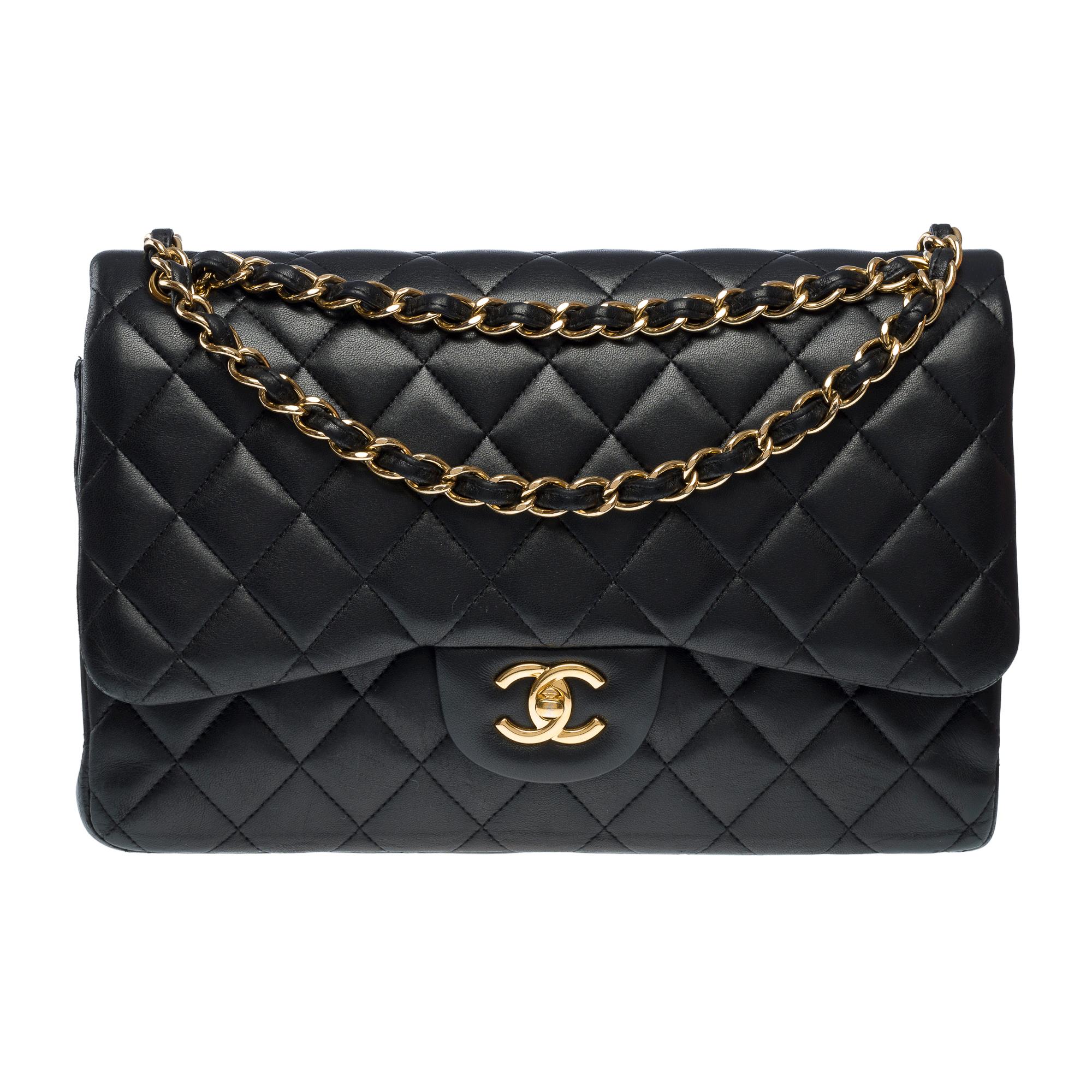Black Chanel Timeless Jumbo double flap shoulder bag in black quilted lambskin , GHW For Sale