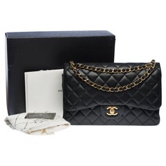 Chanel Timeless Jumbo double flap shoulder bag in black quilted lambskin , GHW