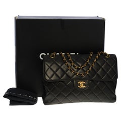 Chanel Timeless Jumbo double sided shoulder bag in black quilted lambskin, GHW