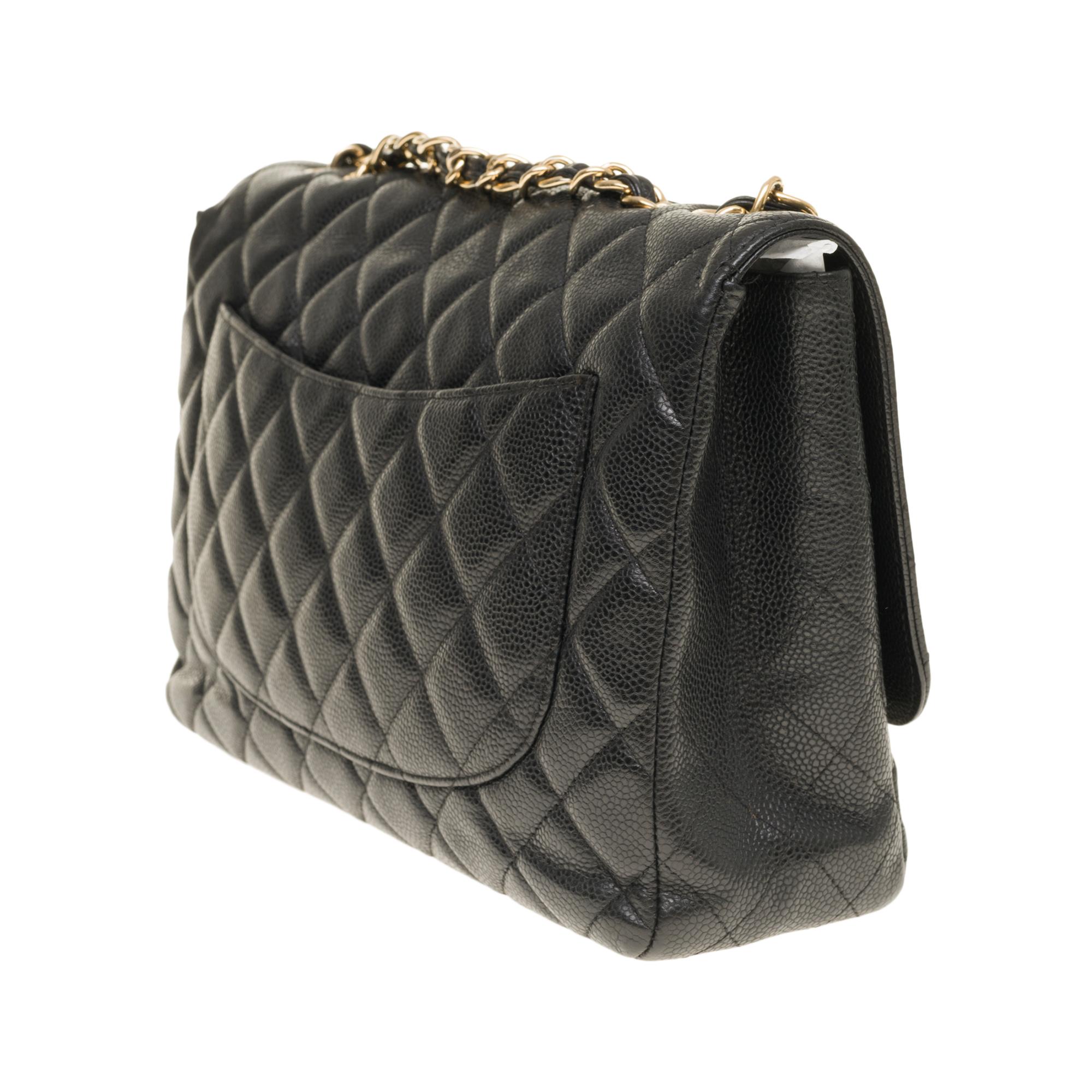 Chanel Timeless Jumbo shoulder bag in black quilted caviar leather, GHW In Good Condition In Paris, IDF