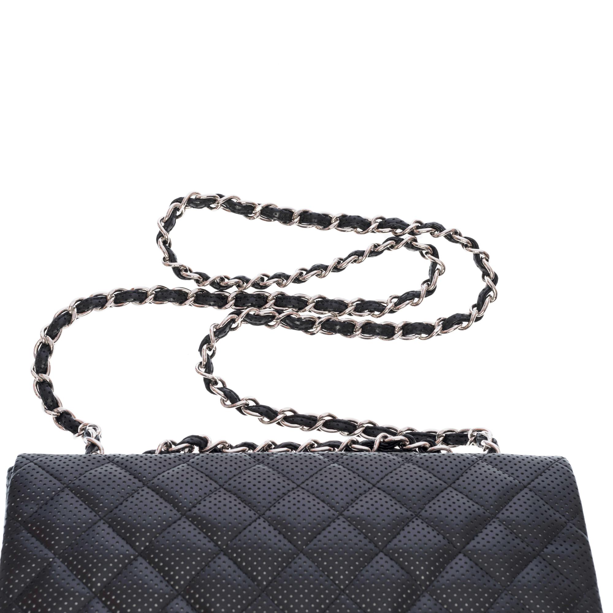 Women's Chanel Timeless Jumbo shoulder Flap bag in black quilted perforated leather, SHW