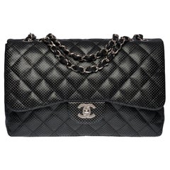 Chanel Timeless Jumbo shoulder Flap bag in black quilted perforated leather, SHW