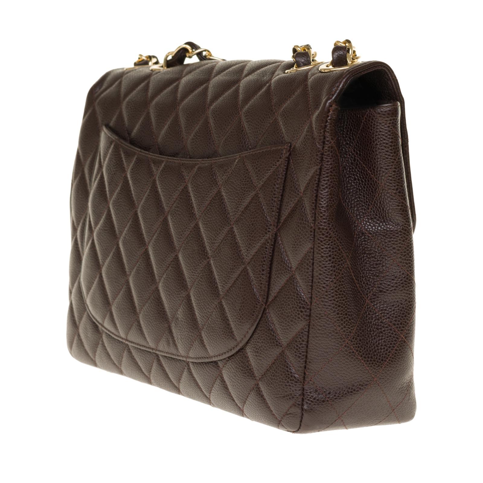 Women's Chanel Timeless Jumbo single flap handbag in brown quilted caviar leather, GHW