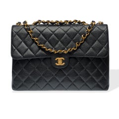 Chanel Timeless Jumbo single flap shoulder bag in black caviar leather, GHW