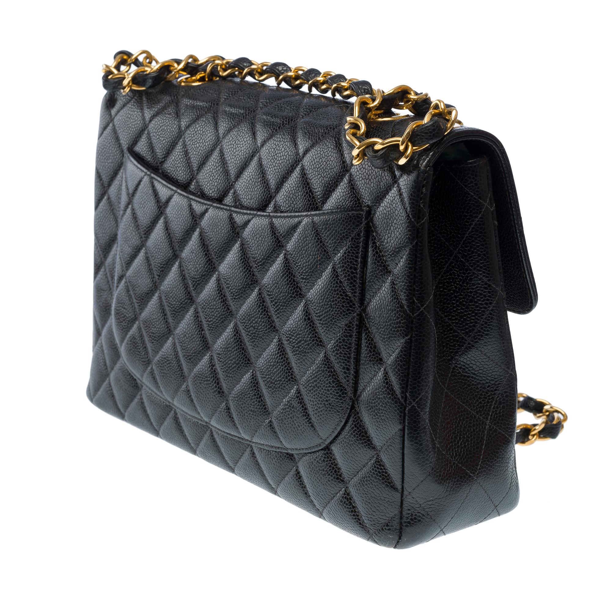 Chanel Timeless Jumbo single flap shoulder bag in black caviar leather, GHW For Sale 1