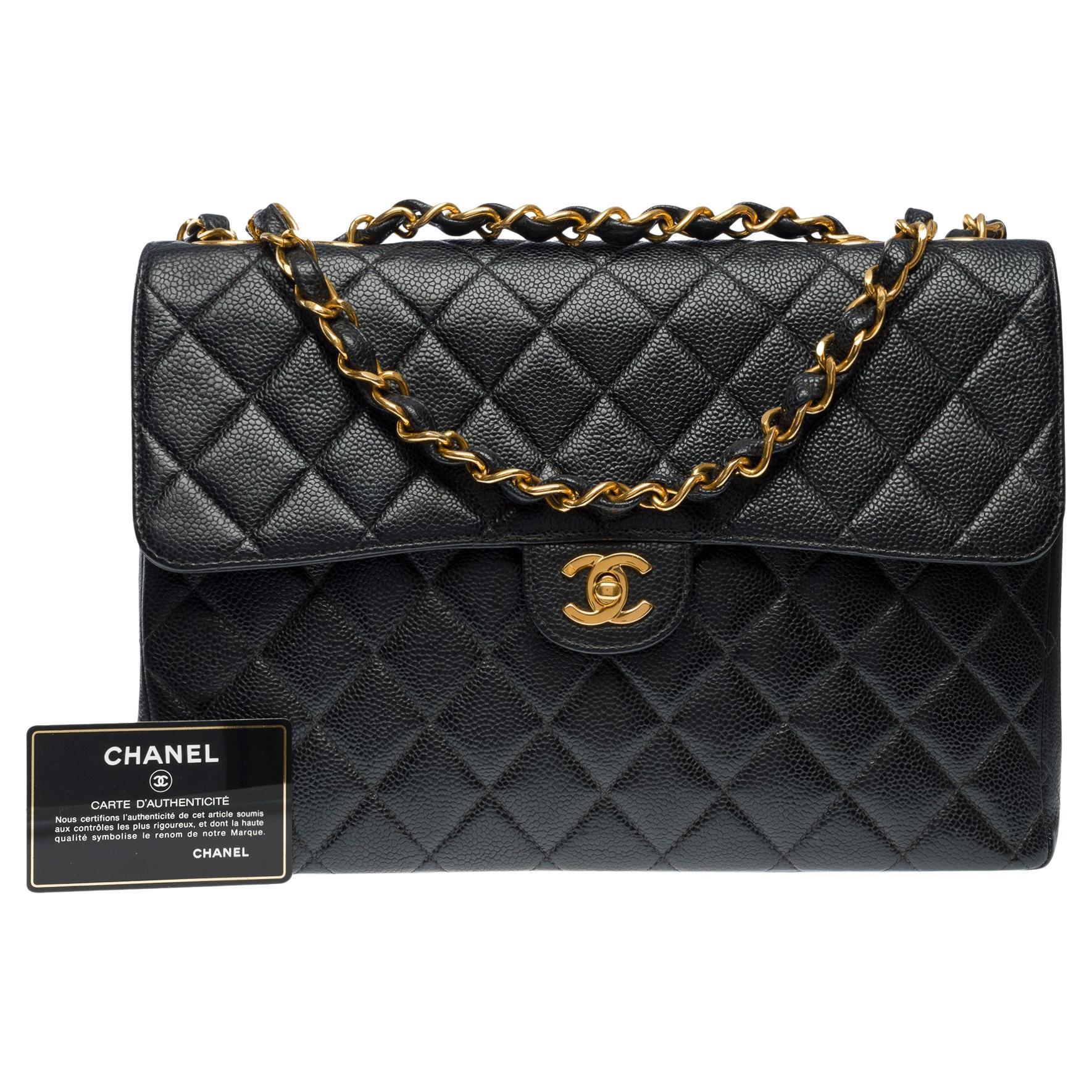 Chanel Timeless Jumbo single flap shoulder bag in black caviar leather, GHW For Sale