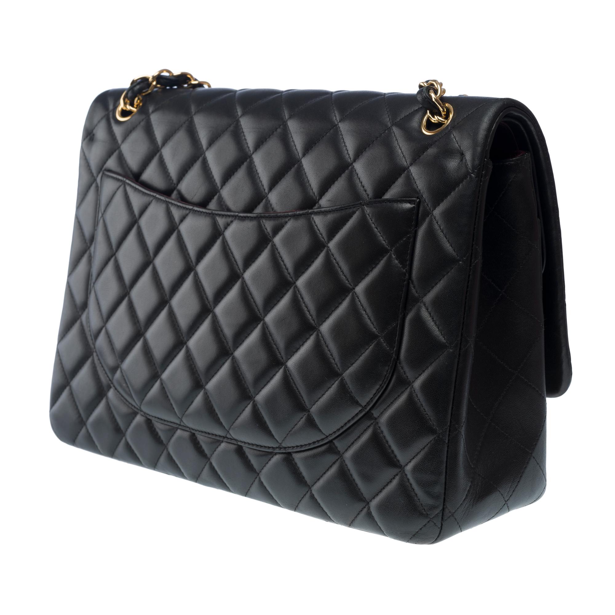 Chanel Timeless Maxi Jumbo double flap shoulder bag in Black quilted lamb, GHW For Sale 2