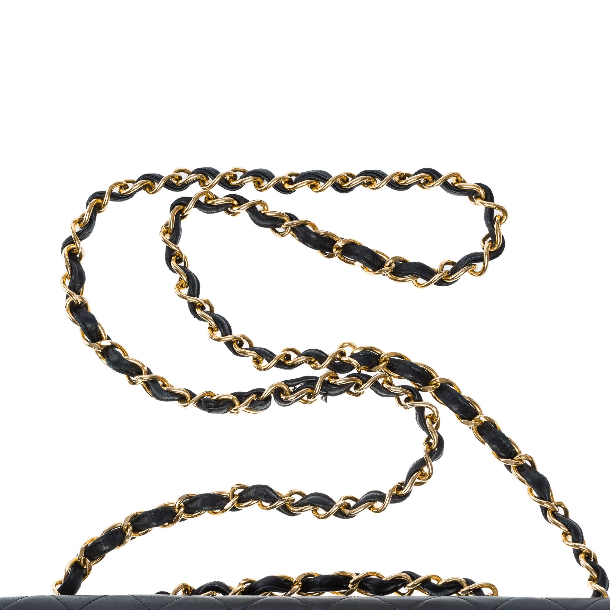 Chanel Timeless Maxi Jumbo flap shoulder bag in black quilted lambskin, GHW For Sale 5