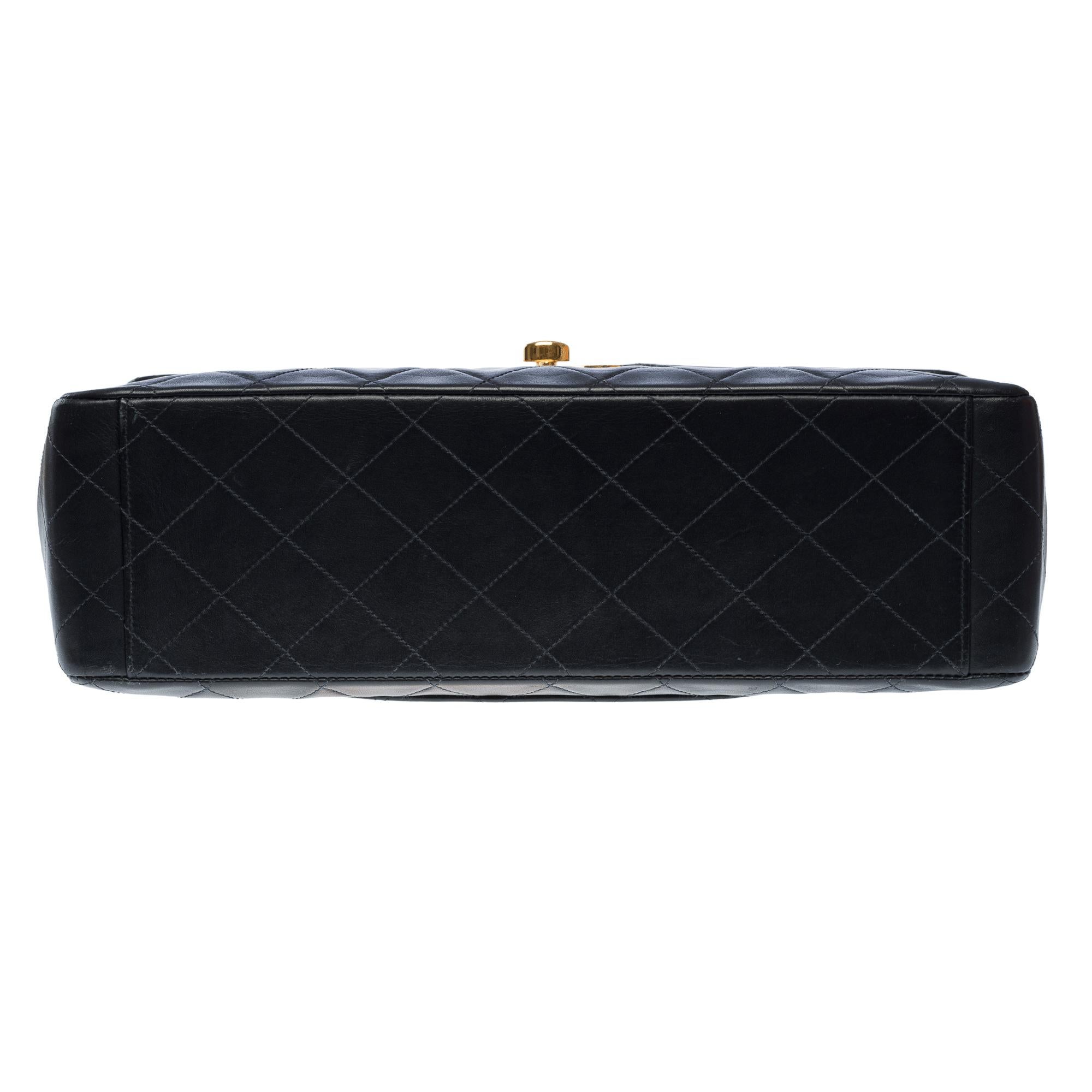 Chanel Timeless Maxi Jumbo flap shoulder bag in black quilted lambskin, GHW For Sale 6
